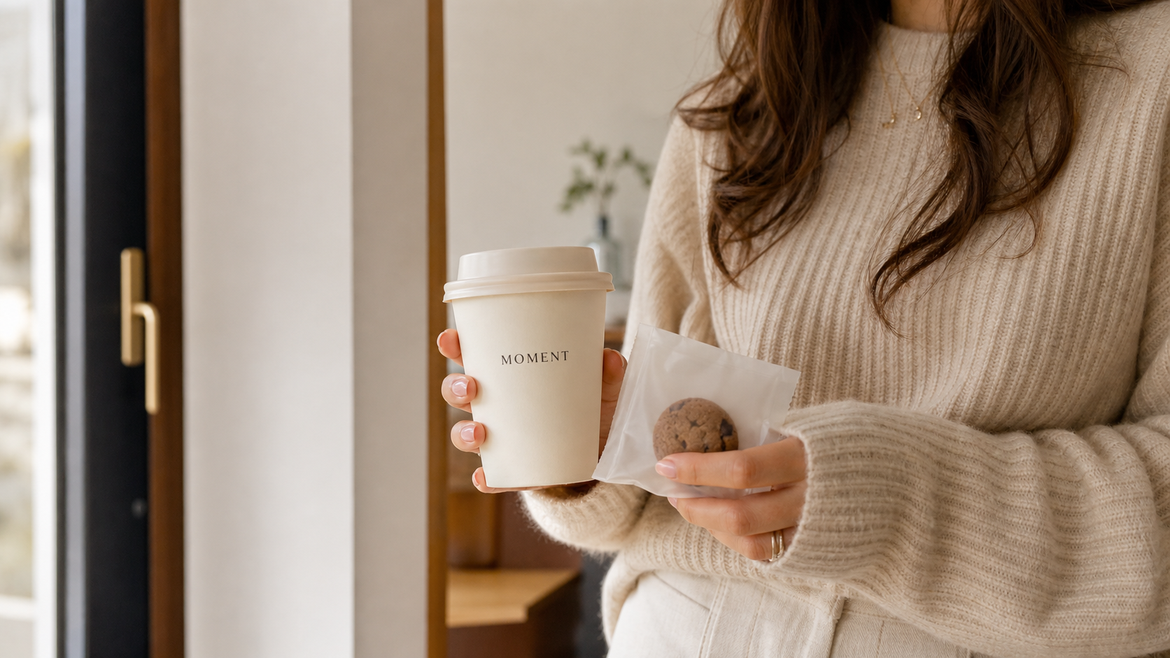 Personal coffee and a small cookie gift lifestyle scene.